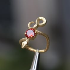 Snake Ruby Gold Plated Ring, 925 Sterling Silver Gold Plated Ring, Garnet Snake Silver Ring, Ruby Silver Ring, Animal Jewelry, Gift For Her Let's not forget that it is handmade. There may be minor differences. I can work the same ring with other natural Gemstones.  Please contact us to learn about our Gem stone stocks. If you have any questions, please feel free to contact me, we are happy to help. Your jewelry will be packed in a luxury jewelry box ready to be given as a special gift. Visit my Snake Ring With Stone, Gemstone Snake Ring Gift, Snake Jewelry Ring, Ruby Silver Ring, Luxury Jewelry Box, Ring Ruby, Snake Jewelry, Gothic Rings, Snake Ring