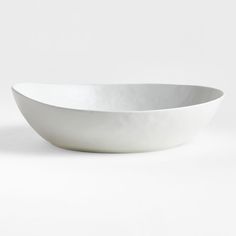 a white bowl sitting on top of a table