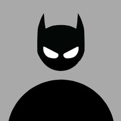 the silhouette of a batman with glowing eyes and fangs on his head, against a gray background