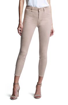 Coated for a sleek sheen, these skinny crop jeans with a high waist polish your look without any effort at all. 26" inseam; 10" leg opening; 10 1/2" front rise; 14 1/2" back rise (size 29) Zip fly with button closure Five-pocket style 86% cotton, 11% elastane, 3% spandex Spot clean only Made in the USA of Imported fabric Women's Clothing