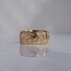 Hand-engraved in deep relief with acanthus leaves and scrolls Band measures 8mm wide Available in 14k gold and oxidized sterling silver Size 7, not sizable Made by Blue Blue Driver in Santa Fe, New Mexico *This ring is not resizable, please confirm your final ring size before purchasing. Custom sizing is available, please contact us if you'd like to inquire.* Art Jewelry Ring, Gold Jewelry Design, Icon Jewelry, Filigree Ring Gold, Leaf Decoration, Deep Relief, Vintage Jewellery Rings, Acanthus Leaves, Acanthus Leaf