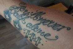 a close up of a person's arm with writing on it