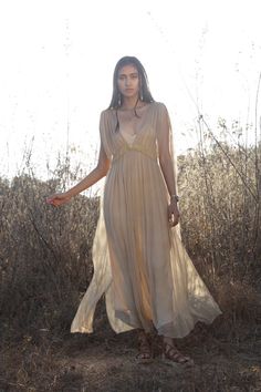 The Jala dress is a modern take on a Grecian inspired romantic feminine style. A beautifully light transparent silk dress that you can get creative layering with your favourite pieces. One Size| AUS 6 - 12 UK 6 - 12 US 2 - 8 EU 34 - 40 Fit | Will drape more on thinner frame Will drape less on fuller frame Paired with | Champagne Rose Slip Note| This fabric varies in shade when in different lights. Dress is transparent. Slip dress is sold separately Care | Please see care label for item specific Ethereal Flowy Party Dresses, Ethereal Sheer Dresses For Summer, Ethereal Sheer Summer Dresses, Silk Summer Dress With Subtle Sheen, Silk Chiffon Dress With Cape Sleeves For Gala, Summer Silk Dress With Subtle Sheen, Spring Wedding Dresses With Cape Sleeves, Chiffon Wedding Dress With Cape Sleeves, Flowy Ethereal Summer Dresses