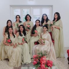 a group of bridesmaids posing for a photo