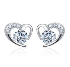 You will feel like you are wearing expensive diamond earrings when you put these elegant studs on! Made with 925 Sterling silver and white gold with clear cubic zirconia that sparkles like a diamond in the light These silver earrings are exquisite, but are also sturdy and built for longevity. Perfect for every occasion Sterling Silver Heart Earrings, Silver Heart Earrings, Purple Diamond, Birthday Jewelry Gift, Heart Studs, Heart Earrings Studs, Paros, Diamond Fashion, Girls Earrings