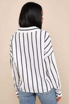 The Lulus Amelia Dawn Off-White Striped Long Sleeve Button-Up Top is perfect for Sunday brunch or Monday in the office! This cotton-blend woven top, covered in vertical black stripes, features long sleeves (with buttoned cuffs) and a collared neckline. Relaxed, straight-cut bodice has a full hidden button placket of tortoise buttons and a patch pocket with contrasting horizontal stripes. Fit: This garment fits true to size. Length: Size medium measures 25.5" from top to bottom. Bust: Great for a Elegant Office Tops With Vertical Stripes, Elegant Vertical Stripe Office Tops, Elegant White Tops With Vertical Stripes, Elegant White Blouse With Vertical Stripes, Chic Pinstripe Formal Tops, Chic Formal Blouse With Vertical Stripes, Striped V-neck Blouse For Work, White Vertical Stripes Blouse For Workwear, Elegant Striped Button-up Tops