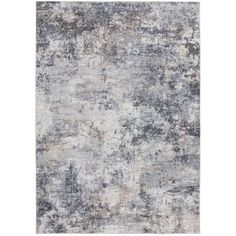 an abstract rug with grey and white colors