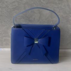 Elegant Quality Sturdy Handbag With Extra Mini Bag Inside, Crossbody Strap, 3 Compartments And Beige Interiors With Pockets. Height 10 In, Length 12 In, Width 5 In. Blue Satchel Box Bag For Formal Occasions, Formal Blue Satchel Box Bag, Blue Square Bag For Formal Occasions, Blue Square Bags For Formal Occasions, Blue Formal Satchel Box Bag, Blue Leather Box Bag For Formal Occasions, Blue Formal Satchel, Blue Top Handle Box Bag For Travel, Blue Top Handle Box Bag For Office