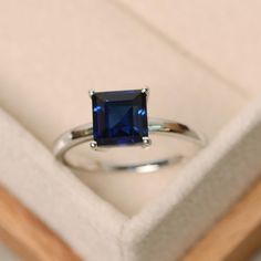 Sapphire ring square ring blue sapphire ring solitaire | Etsy Classic Emerald Cut Sapphire Ring In Sterling Silver, Classic Emerald Cut Sterling Silver Sapphire Ring, Classic Sterling Silver Sapphire Ring With Emerald Cut, Silver Sapphire Solitaire Ring Princess Cut, Blue Radiant Cut Sapphire Ring In Sterling Silver, White Gold Sapphire Promise Ring Square Cut, Elegant Square-cut Sapphire Ring In Sterling Silver, White Gold Square Cut Sapphire Promise Ring, Square Cut Sapphire Ring In White Gold For Promise