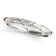 a white gold wedding ring with filigrees