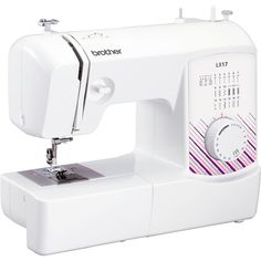 a white sewing machine sitting on top of a white table next to a black and white clock