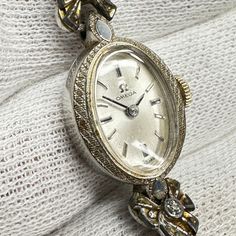 Omega Jeweled Ladies Cocktail watch 10k Gold Filled Case 17 Jewels Wind Up movement made in Switzerland by Omega keeping good time. Beautiful cocktail watch. Ships immediately Vintage Diamond Watch With Subdials For Anniversary, Antique White Gold Watch With Polished Finish, Antique White Gold Watches With Polished Finish, Collectible Timeless White Gold Watches, Timeless White Gold Collectible Watches, Vintage White Gold Watches With Subdials, Antique White Gold Collectible Watch, Vintage White Gold Watches With Polished Finish, Vintage White Gold Watches With Round Dial