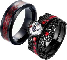 two black rings with red crystals on them