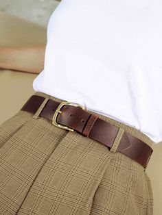 The product:  the whisky belt is agile and soft to touch.  both casual and sophisticated.  this all rounder belt glides well into a suit pant while feeling entirely comfortable wrapped around your casual jeans.    features:  handmade from full grain cow hide with a solid brass buckle.    dimensions:  width - 4cm  length - available in any length    sizing:  to determine your belt size go one size up from your pant size.  for example if you are a pant size 36 you will be a belt size 38. Classic Leather Belt Buckles For Fall, Classic Leather Belts For Fall, Classic Leather Belt For Fall, Classic Brown Belts For Business Casual, Classic Brown Belt For Business Casual, Brown Leather Belt Buckles For Work, Leather Belt Buckles With Brass Buckle For Work, Brown Belt With Brass Buckle For Work, Brown Workwear Belt With Brass Buckle