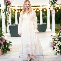 Elevate your fall wardrobe with our Women's Lace Long Sleeve V Neck Maxi Dress. Perfect for casual boho vibes or as a charming wedding guest outfit, this dress features delicate lace detailing and a flattering smocked waist. Flowy Lace Trim Dress For Fall, Spring Modest Dress With Lace Trim, Modest Spring Dresses With Lace Trim, Chic Fall Maxi Dress With Lace Trim, Fall Garden Party Dress With Lace Trim, Spring Bohemian Lace Boho Dress, Fall Lace V-neck Maxi Dress, Cream Lace Dress For Fall, Spring Bohemian Maxi Dress With Lace Sleeves