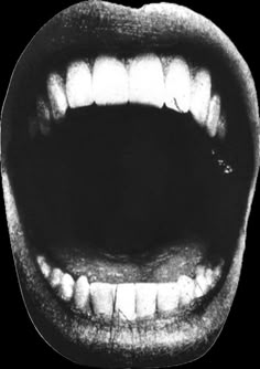 an open mouth with white teeth and no teeth, showing the upper part of the mouth