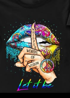 a t - shirt with the words let it be written in front of a peace sign