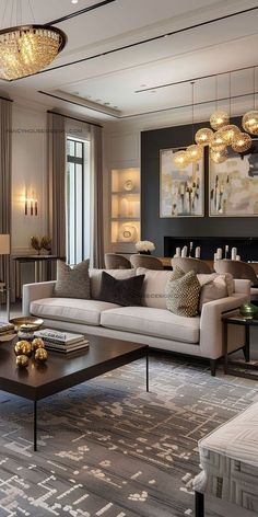 a living room filled with furniture and a chandelier