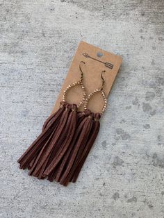 These lightweight tassel fringe earrings are hand designed, meticulously hand cut very fine for a very soft flowing fringe feel. These statement yet staple earrings are simple yet bold for the most versatile wear! You will get compliments everywhere you wear them! Made out of hand cut deerskin leather and faceted crystal, or natural stones. These free spirited fringe earrings are perfect for any occasion dressed up or paired with T-shirt and jeans. Leather earrings are very light on your ears, s Leather Tassel Earrings, Staple Earrings, Gold Crystals, Accessory Ideas, Deer Skin, T Shirt And Jeans, Tassel Fringe, Free Spirited, Leather Tassel