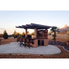 Outdoor Kitchen T.V. Media Wall with Pergola and Outdoor Bar Outdoor Bar Seating, Built In Bbq Grill, Outdoor Grill Island, Arizona Backyard, Brick Projects, Grill Island, Outdoor Barbeque, Tv In Kitchen, Dream Patio