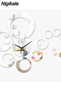 an image of a clock made out of various circles and shapes with the words nigitala above it