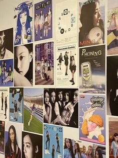 a wall covered with posters and pictures of women