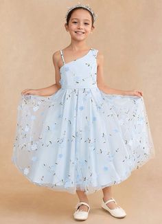 Ivilia is our sweet and joyful flower girl A-line dress made from our embroidered tulle. She features a one shoulder neckline. The A-line skirt has box pleating that creates a playful yet sophisticated silhouette. Spring Flower Girl Dresses, Light Blue Flower Girl Dresses, Pastel Flower Girl Dresses, Blue Flower Girl Dress, Simple Flower Girl Dresses, Summer Flower Girl Dresses, Tea Length Flower Girl Dress, Tea Length Tulle, Flower Girl Dresses Blue