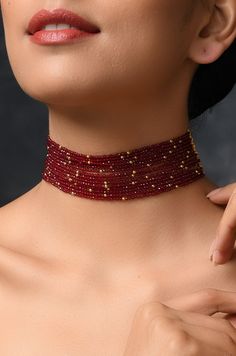 Red Stones Choker Necklace Length - 14 inches DETAILS -100% top Quality -22K gold plated silver copper alloy. -Handcrafted in our all girls workshop in Paisley Pop Studio, Jammu and Kashmir STYLE TIP A simple even dull outfit will almost always look transformed into something special with the right jewellery and accessories. You can choose this choker necklace to bring a simple outfit to life. This look perfect when you are wearing a traditional or indo-western outfit. Handcrafted in Jammu and K Red Ruby Choker Jewelry, Polished Beads Choker Necklace For Gifts, Red Gold Plated Temple Jewelry Necklaces, Red Choker Necklace For Gift, Red Ruby Choker Necklace, Temple Jewelry Style Gold Plated Choker, Gold Ruby Round Bead Necklaces, Gold Plated Temple Jewelry Choker As Gift, Red Jewelry With Gold Beads For Jewelry Making