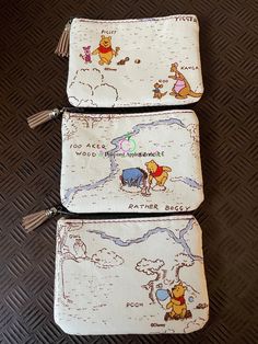 three winnie the pooh zippered pouches