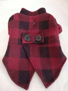 a red and black plaid dog coat with buttons