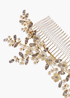 The Persephone Comb is inspired by the work of Botticelli: rife with pearls, botanicals, and femininity. This piece is a one-of-a-kind work of art, combining delicate Swarovski pearls, leaf-shaped Swarovski crystals that are set by hand, and flowers that are painted by hand in our Brooklyn studio. The shape recalls a sprig of wildflowers effortlessly tucked into the hair; the Persephone Comb can be worn with a veil to complete a bridal look. Dimensions: 6 x 3.5 inches Weight: 44g Luxury Hair Accessories, Luxury Hair, Bridal Look, Swarovski Pearls, Leaf Shapes, Bridal Looks, Veil, Comb, Swarovski Crystals