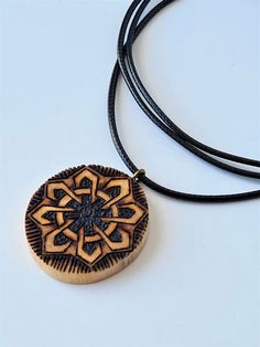 Pagan jewelry designed for good luck. Made of a tree branch that has dried and broken. Approximate dimension of pendant: height - 3.3cm width - 3cm rope lenght - min.40cm - max. 80cm (adjustable) Brown Amulet Jewelry As A Gift, Brown Amulet Style Jewelry As Gift, Spiritual Natural Color Necklaces As Gift, Nature-inspired Natural Color Jewelry As A Gift, Handmade Medallion Jewelry For Good Luck, Handmade Medallion Necklace For Good Luck, Artisan Natural Pendant Jewelry, Artisan Natural Color Pendant Necklace, Artisan Natural Color Pendant Jewelry