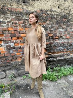 "Spring dress, Write the selected color in the message Handmade nut brown linen dress with 3/4 long sleeves and 2 pockets , perfect for casual wear and suitable for any occasion in any season Details: - 100% natural linen produced in Europe ; - medium weight (180 gram per square meter); - color: nut brown, could be any from our colors catalog (color samples at the photo); Made to order, approximately a few days, If you have any questions please message me and I will be glad to answer. Size guide Neutral Long Sleeve Linen Dress, Brown Linen Fall Dress, Spring Long-sleeve Neutral Linen Dress, Spring Long Sleeve Neutral Linen Dress, Neutral Long Sleeve Linen Dress For Spring, Spring Neutral Long Sleeve Linen Dress, Brown Linen Long Sleeve Dress, Casual Brown Linen Dress For Fall, Casual Brown Linen Midi Dress