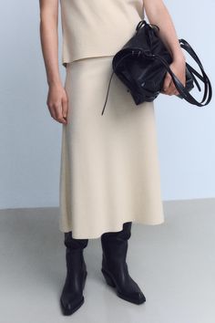 VOLUMINOUS SOFT MIDI SKIRT Chic Lined Midi Skirt, Chic Midi Skirt With Elastic Waistband, Chic Voluminous Midi Skirt, Lined Midi Pencil Skirt, Chic Midi-length Flowy Skirt, Chic Flowy Midi Skirt, Chic Midi-length Bottoms With Elastic Waistband, Zara Long Pleated Skirt, Chic Flared Skirt With Elastic Waistband