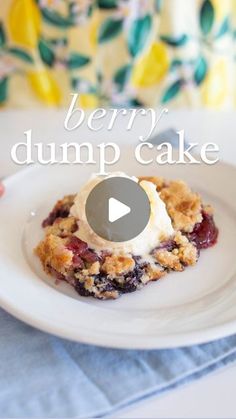 berry dump cake on a white plate with the words berry dump cake in front of it