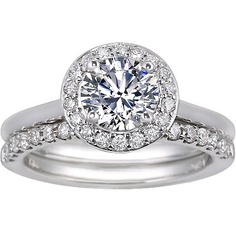 a white gold engagement ring set with diamonds