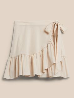 Wrap Ruffle Mini Skirt | Banana Republic Factory Spring Mini Length Wrap Skirt, Chic Mini Skort For Brunch, Trendy Mini Hem Skort For Summer, Beige Summer Mini Skirt For Brunch, Chic Summer Skort For Brunch, Trendy Summer Mini Hem Skort, Beige Mini Skirt For Summer Brunch, Beige Summer Brunch Mini Skirt, Summer Mini Length Relaxed Wrap Skirt