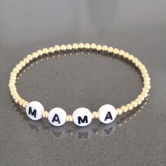 "* 3 mm Gold Filled (14/20) Beads * MAMA Bracelet -- Personalized with your name or message Available in Various Sizes. Please choose from drop down list. I make 6.5\" for most wrist size To determine your bracelet size: Measure with a tape around your wrist (where you would like the bracelet to sit). If you don't have access to a measuring tape, wrap a string around your wrist and measure the length with a ruler. This is your wrist size. To determine your bracelet size add 1/2\" for a snug fit Personalized Meaningful Beaded Bracelets As Gift, Meaningful Adjustable White Name Bracelet, Personalized Round Bracelets For Gifts, Personalized Round Bracelet As A Gift, Meaningful Hypoallergenic White Bracelets, Meaningful White Bracelet Jewelry, Meaningful White Jewelry With Letter Beads, Meaningful Everyday White Jewelry, Adjustable Meaningful Bracelets With Custom Name