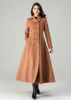 "FEATURES 50% wool, 50% wool blend Fully liner with polyester Two pockets Lapel collar Long sleeve Button closure in front For Winter, Autumn dry clean ★★Mode size Height 170cm (5′ 7″)  Bust 84 cm (33\")  Waist 66 cm (26\")  She wears size XS. ★★Bespoke Order Service If you Request other color Request the length Your height is not between 155 cm- 175 cm Your weight is not between 47 kg -77 kg I can do it for you, It will need some extra fee depending on on your need. Contact with me for more det Formal A-line Outerwear For Fall, Formal A-line Fall Outerwear, Classic A-line Fall Outerwear, Solid A-line Outerwear For Fall, Long Wool Coat With Double Button Closure For Fall, Fall Long Wool Coat With Double Button Closure, Brown Double-breasted Wool Coat For Winter, Winter Brown Double-breasted Wool Coat, Tailored A-line Outerwear For Winter