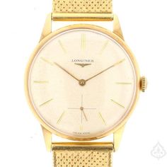 Description: Add a touch of luxury to your watch collection with this vintage 18K Longines watch. Crafted from 18K yellow gold, this watch is a true statement piece with its intricate design and attention to detail. Specifications: Metal: 18K Yellow Gold Weight: 66.7g Brand: Longines Item Code: 891250 Classic Yellow Gold Watches With Polished Finish, Timeless Yellow Gold Watch With Rectangular Dial, Classic Yellow Gold Watch Accessories With Subdials, Timeless Yellow Gold Diamond Watch With Round Dial, Classic Yellow Gold Watches With Subdials, Formal Yellow Gold Diamond Watch With Round Dial, Formal Yellow Gold Diamond Watch, Timeless Yellow Gold Diamond Watch With Subdials, Classic Gold Watch With Diamond Hour Markers