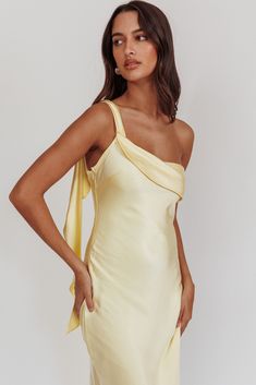 Shop the Carmel One-Shoulder Sash Maxi Dress Butter | Selfie Leslie Off The Shoulder Maxi Dresses, Runway Formal Dresses, Yellow One Shoulder Dress, Classy Semi Formal Dresses, Butter Yellow Prom Dress, Yellow Silk Prom Dress, Pastel Yellow Maxi Dress, Grapefruit Bridesmaid Dresses, One Shoulder Silk Dress