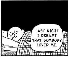 an image of a cartoon sleeping on a bed with the caption snoopy sure does like peanut butter