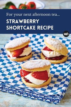 strawberry shortcakes on a blue and white checkered napkin