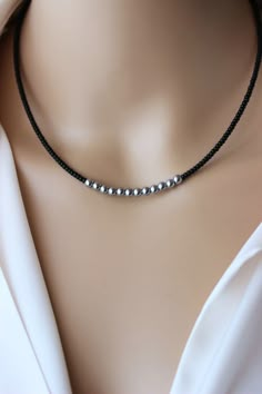 This unique dainty necklace was made of black glass seed beads, silver tone hematite stone 5 mm beads, strong nylon  double thread, stainless steel end clasps, stainless steel lobster clasw and steel adjustable length chain. Perfect jewelry for everyday wear! You can wearing it with other chokers,chain necklaces or alone! Total length of necklace is 42 cm or 16.5 inches and 4 cm of adjustable length chain. PLEASE NOTE: The silver tone pendant necklace is not included in the price and serves as a Black Beads Necklace Designs, Black Chains Jewelry, Italian Horn Necklace, Unique Choker, Beads Choker Necklace, Seed Beads Necklace, Diy Choker, Black Beaded Necklace, Beads Choker