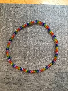 Beaded multi-colored bracelet. Stretch cord and seed beads 6-1/2 inches. $4.00 🇺🇸 Free Shipping in the United States🇺🇸 Rainbow Beaded Friendship Bracelets, Rainbow Beads Bracelet For Friendship, Casual Rainbow Beaded Bracelet For Festivals, Rainbow Colorful Beads Friendship Bracelets For Jewelry Making, Casual Rainbow Friendship Bracelets With Tiny Beads, Casual Rainbow Beaded Bracelets For Festivals, Adjustable Rainbow Beaded Bracelets With Spacer Beads, Multicolor Tiny Beads Friendship Bracelets, Casual Multicolor Tiny Beads Friendship Bracelets