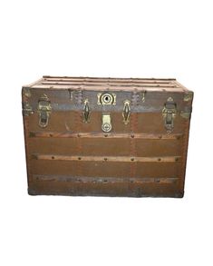 an old trunk is sitting on the floor with its lid open and two handles closed