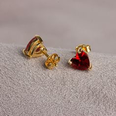 Garnet is the birthstone for those born in January. Garnet ; the representative of passion. The heart symbol represents love. You can also represent your love for yourself and your loved ones with our heart earrings. Other Products Compatible with Our Garnet Heart Earring: https://artdiamonds.etsy.com/listing/1405045357/garnet-heart-necklace-14k-solid-gold?utm_source=Copy&utm_medium=ListingManager&utm_campaign=Share&utm_term=so.lmsm&share_time=1693581805762 https://artdiamonds.etsy.com/listing/1557295253/heart-garnet-ring14k-solid-gold?utm_source=Copy&utm_medium=ListingManager&utm_campaign=Share&utm_term=so.lmsm&share_time=1693582922888 14K Solid Gold Garnet Heart Earrings,January Jewelry, Gift Earring, Heart Earring,Christmas Gift, Garnet Earrings, Lover and Friend Gift F E A T U R E S * Heart-shaped May Birthstone Earrings For Anniversary, Heart Shaped May Birthstone Earrings For Anniversary, Heart Shaped Ruby Jewelry With Prong Setting, Heart-shaped Ruby Jewelry With Prong Setting, Heart-shaped Ruby Birthstone Jewelry, Valentine's Day Ruby Birthstone Jewelry, Valentine's Day Ruby Jewelry With Matching Earrings, Fine Jewelry Birthstone For Valentine's Day, Ruby Jewelry With Earrings For Valentine's Day