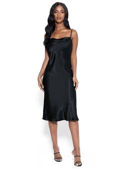 The iconic satin slip dress makes a comeback. This cowl-neck midi style is a wardrobe staple. Slip Dress Midi, Black Satin Slip Dress, Cowl Neck Slip Dress, Stretchy Bodycon Dress, Red Bandage Dress, Silver Cocktail Dress, Slip Midi Dress, Dresses By Color, Satin Evening Dresses