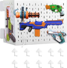 PRICES MAY VARY. [ Easy Assembly Wall Tool Organizer ] - This pegboard organizer measures 14.2 x 8.5 x 11 inches, is perfectly fits your wall space [ Durable And Sturdy Construction Pegboard Wall ] - Made of ABS plastic, this wall tool organizer is designed for longevity. Stronger than your typical plastic pegboard, it can securely hold your Toy Blasters and accessories in place [ Versatile And Multipurpose Tool Peg Board Organizer Wall Mount ] - Not just for Toy Blasters, this garage pegboard t Desk Pegboard, Wall Tool Organizer, Garage Pegboard, Plastic Pegboard, Pegboard Wall, Wall Organizer, Board Wall, Wall Organization, Wall Storage