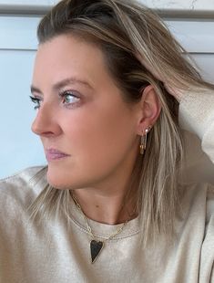 Introducing our 18k gold-plated Lock Drop Earrings - the perfect way to add a touch of boldness to your look. With an edgy design and lightweight feel, they're the ideal choice for anyone looking to make a statement that stands out from the rest. At just over an inch in length, these earrings are the perfect size to show off your daring side without being too overwhelming. Don't be afraid to stand out with these unique and stylish Lock Drop Earrings. Trendy Dangle Huggie Earrings, Trendy Everyday Tarnish Resistant Huggie Earrings, Trendy Linear Drop Earrings, Trendy Everyday Huggie Earrings With Ear Wire, Trendy Drop Earrings For Everyday, Trendy Dangle Earrings For Everyday, Trendy Everyday Huggie Earrings, Trendy Everyday Jewelry With Ear Wire, Trendy Plated Earrings